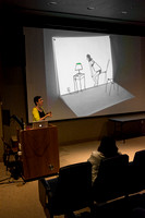 Another small video. The table and lamp are drawn, the chair is wire sculpture, and the projection of the moving female figure casts the chair's shadow on the page. — at Albright College.
